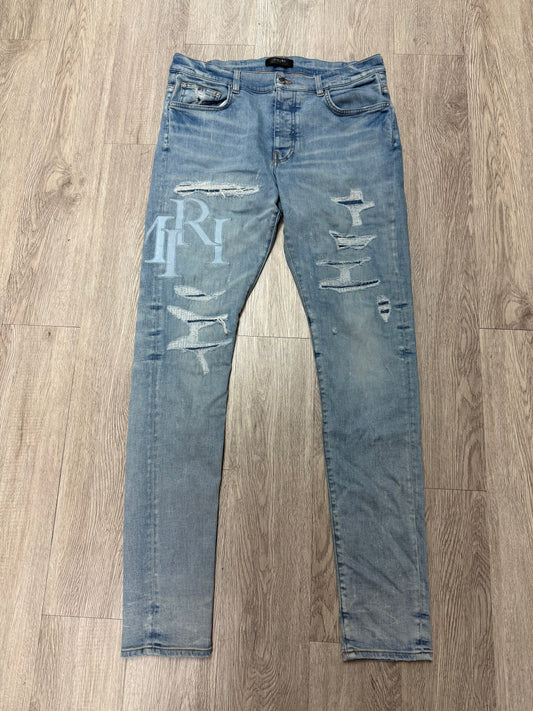 Amiri Jeans Light Wash Baby Blue Staggered Logo Used