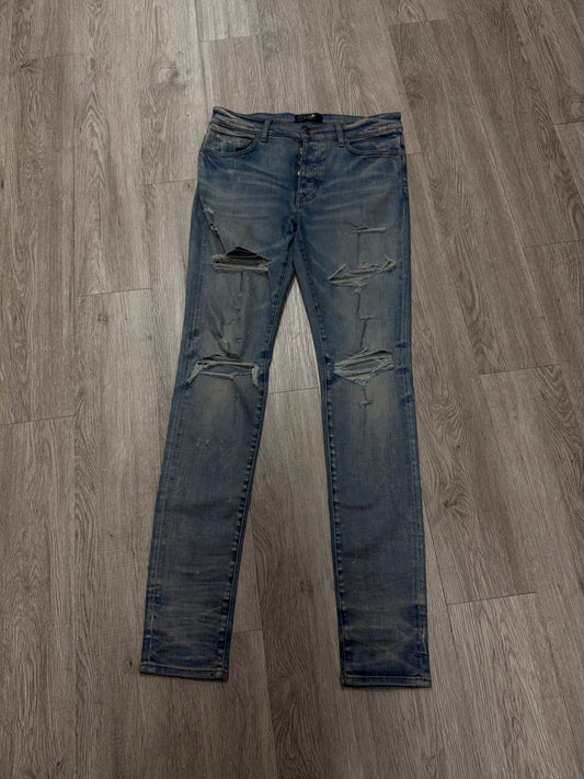 Amiri Light Wash Thrasher Rip Jeans