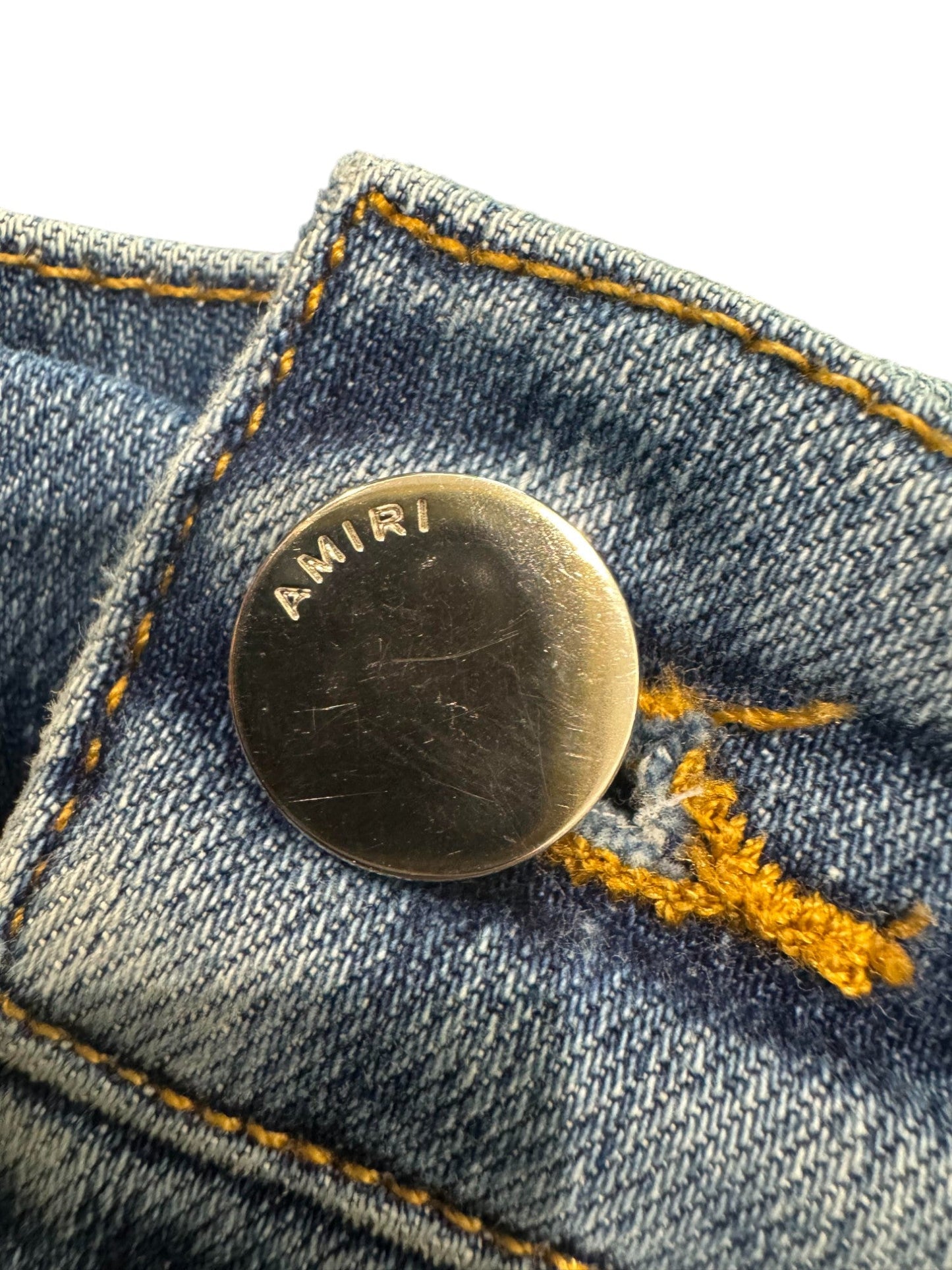 Amiri Knee Rip Light Wash Jeans
