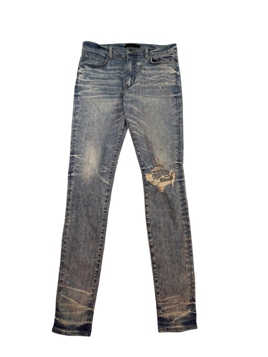 Amiri Knee Ripped Light Wash Jeans