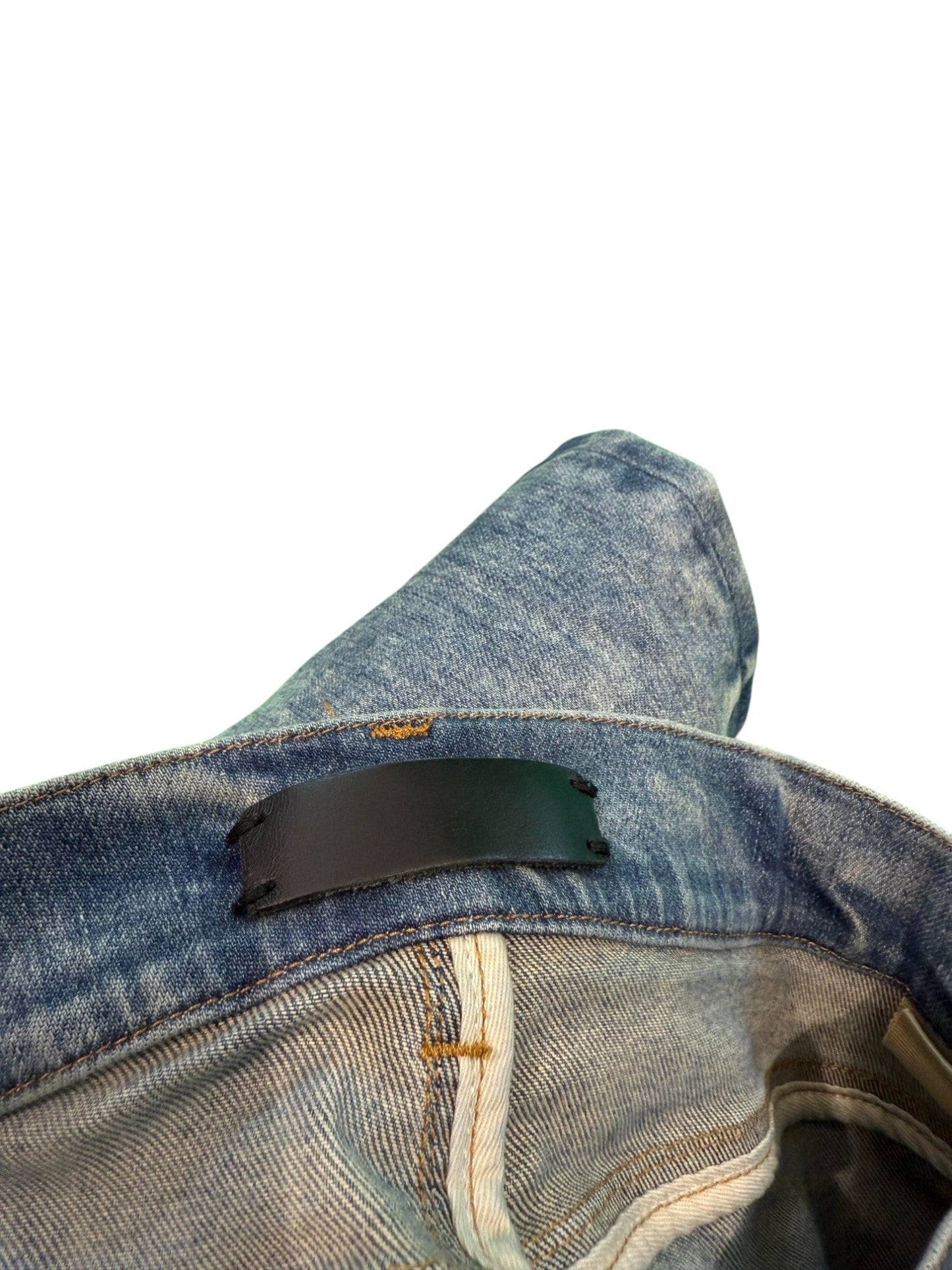 Amiri Knee Ripped Light Wash Jeans